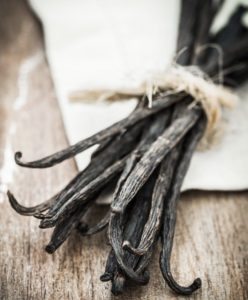 Vanilla sticks on a wooden table.